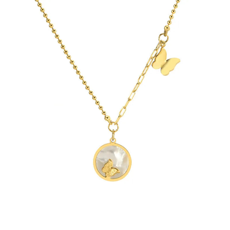 Schmuckset mit Muschel-und Schmetterlingsmotiv aus Edelstahl 316L.