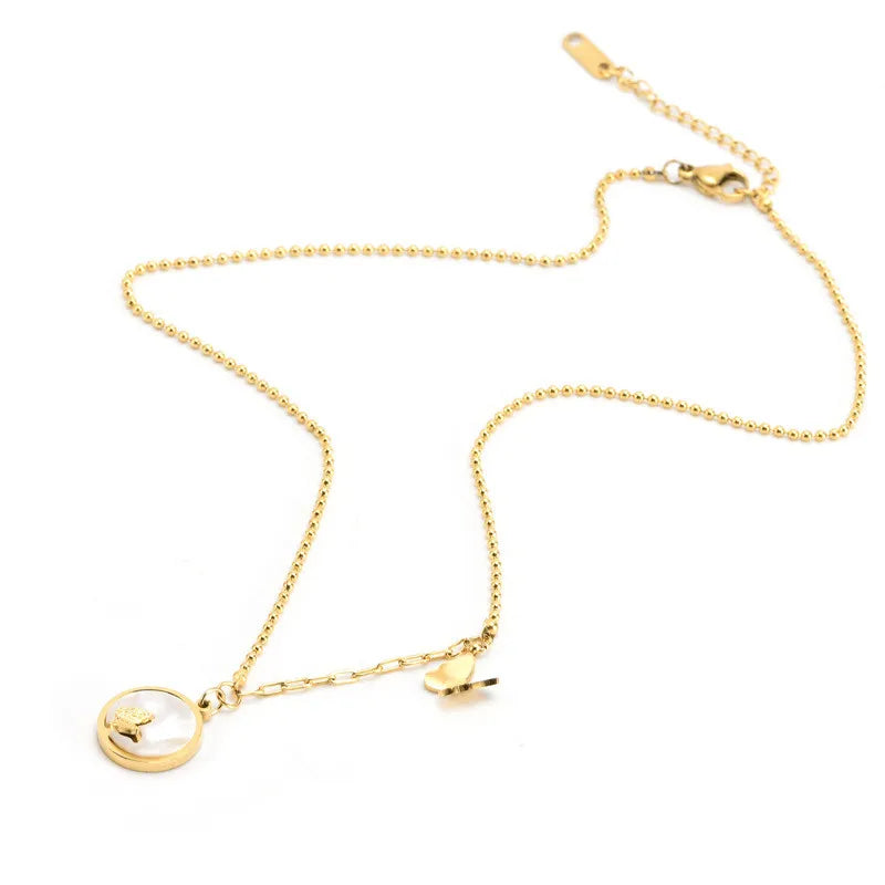 Schmuckset mit Muschel-und Schmetterlingsmotiv aus Edelstahl 316L.